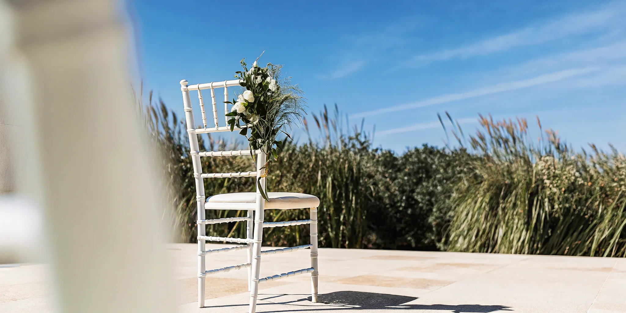 Wedding chair with flowers.